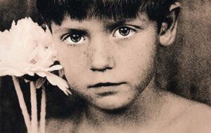 Fine Art Portrait of Boy With Flower
